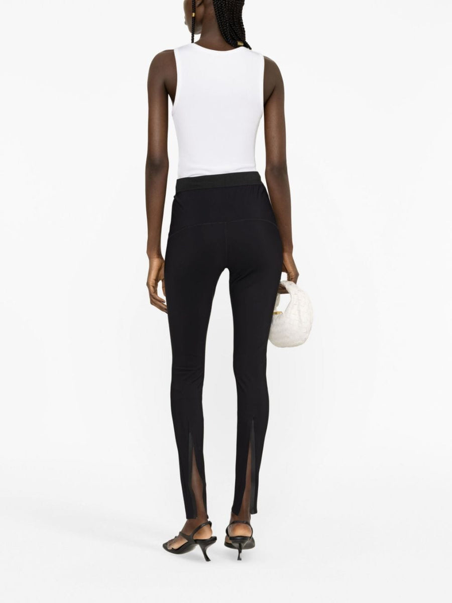 Wardrobe.NYC High Waist Zipped Leggings For Women Black Sleek Silhouette Elastic Waist Rear Slit