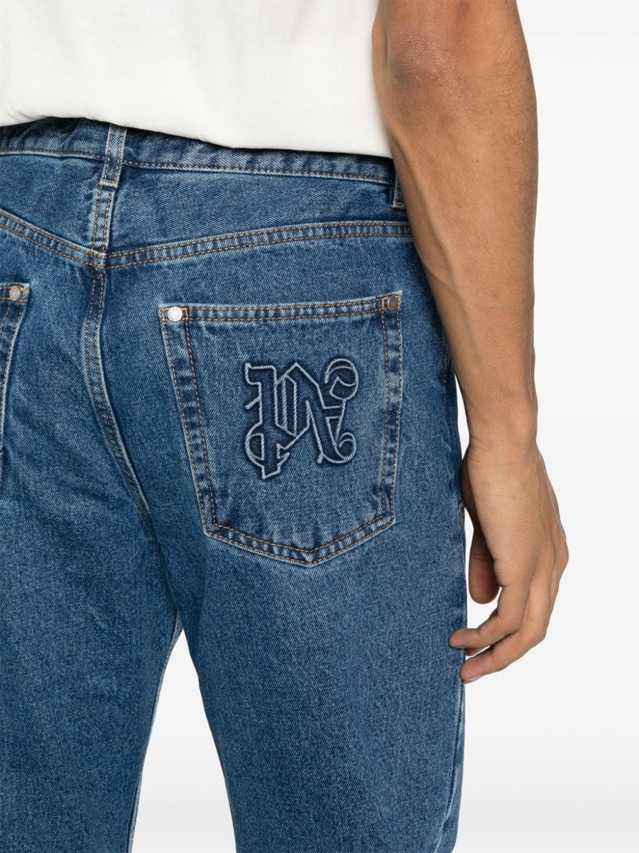 Palm Angels Monogram Denim Jeans Navy One Hundred Percent Cotton Midwash With Contrast Stitching For Men