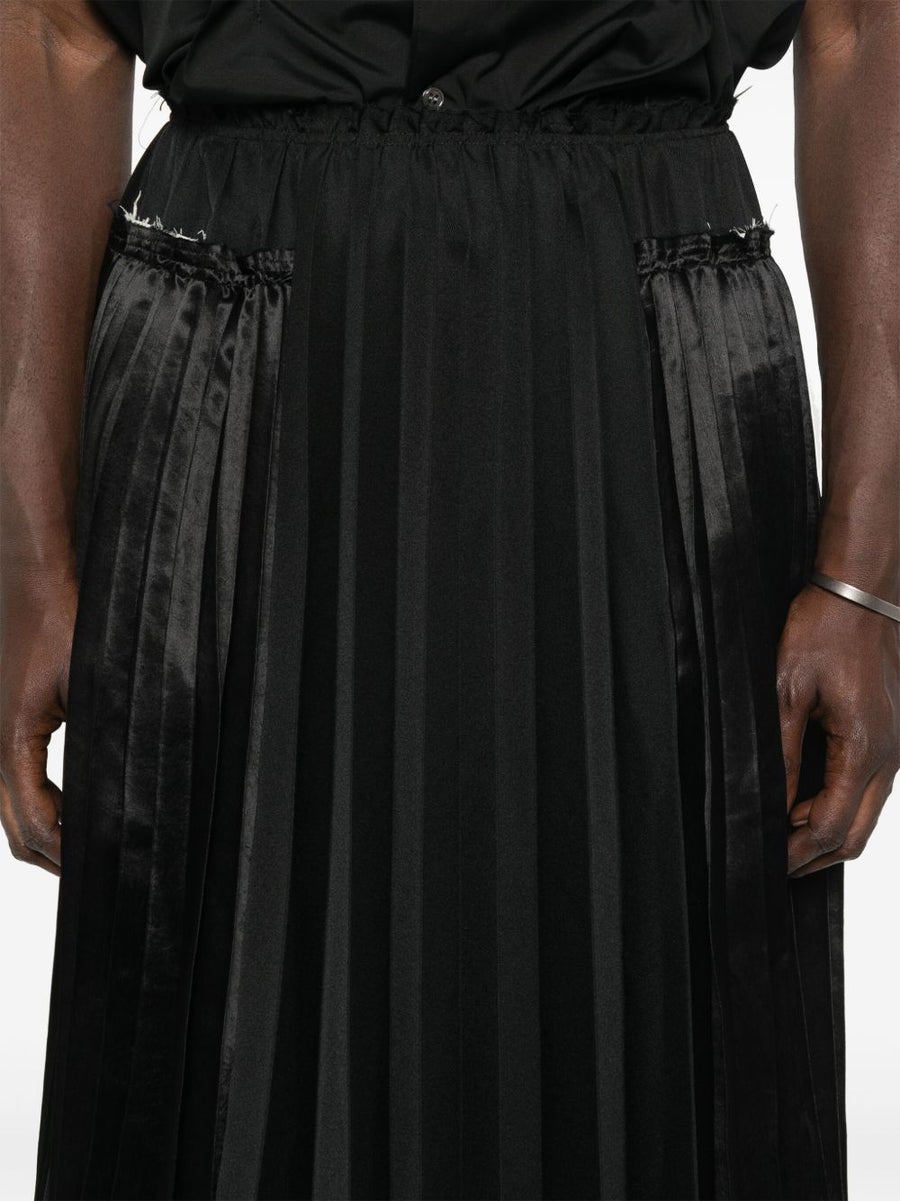 Comme Des Garcons Pleated Midi Skirt for Men Timeless Structured Silhouette with Ribbed Texture in Black