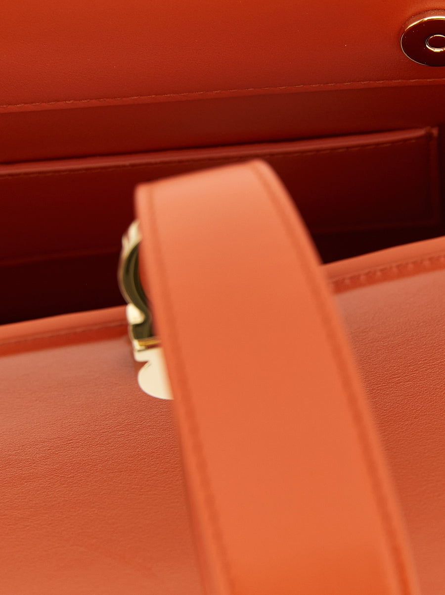 Ferragamo Mini Clutch Luxurious Orange Calfskin Wristlet With Bracelet Strap And Hidden Snap Closure For Women