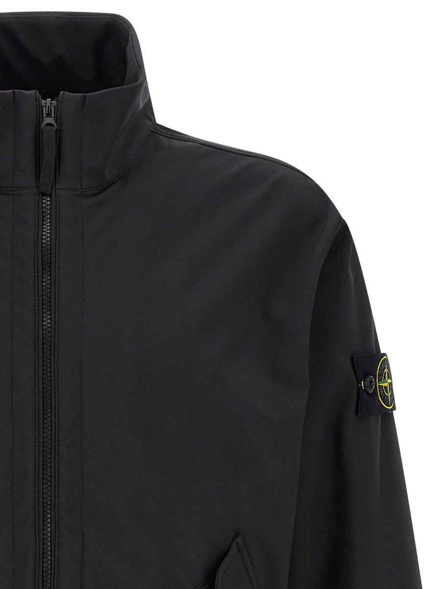 Stone Island Three Layer Waterproof Jacket For Men With High Neck Logo Badge Applique And All Weather Protection