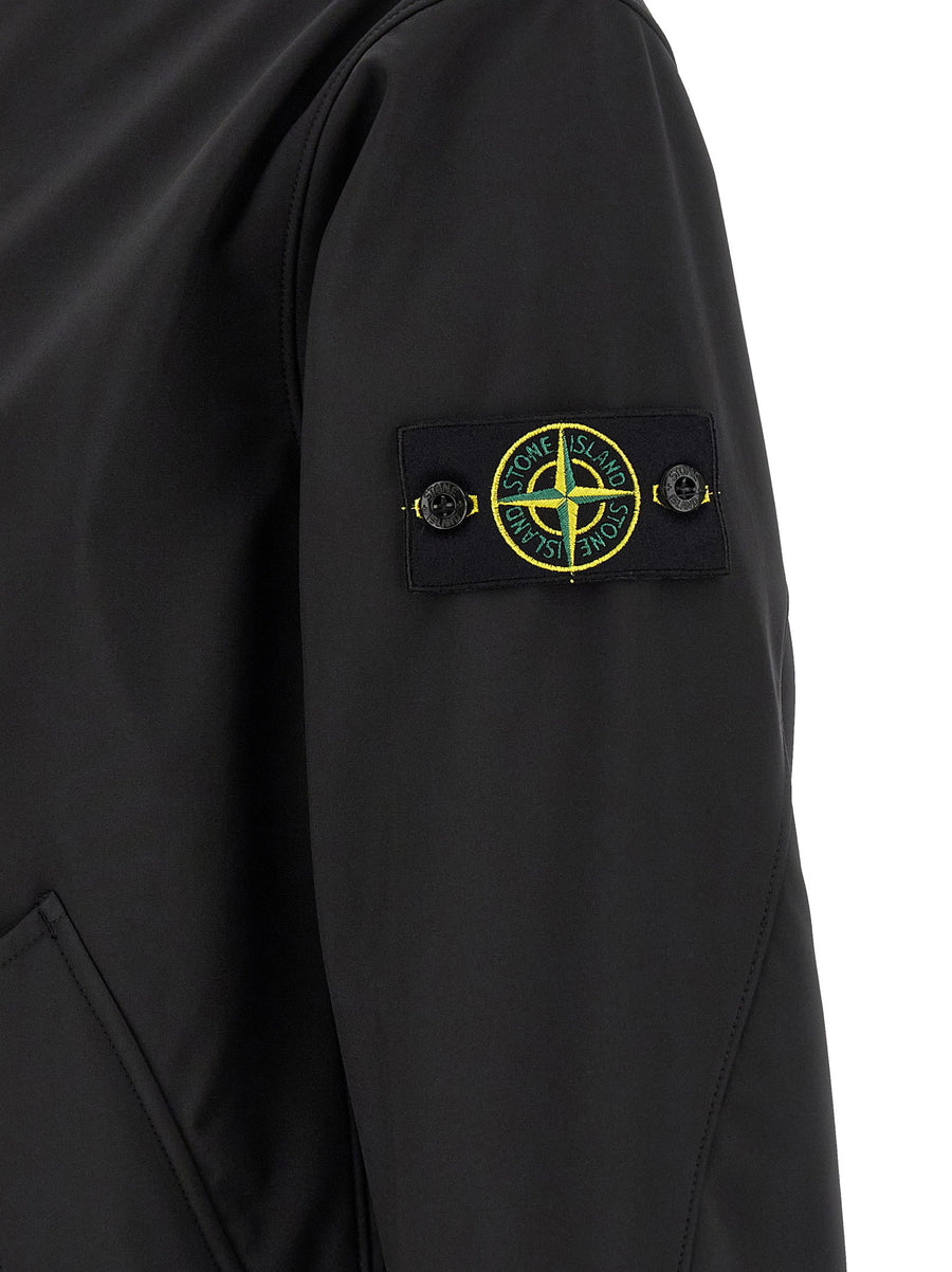 Stone Island Three Layer Waterproof Jacket For Men With High Neck Logo Badge Applique And All Weather Protection