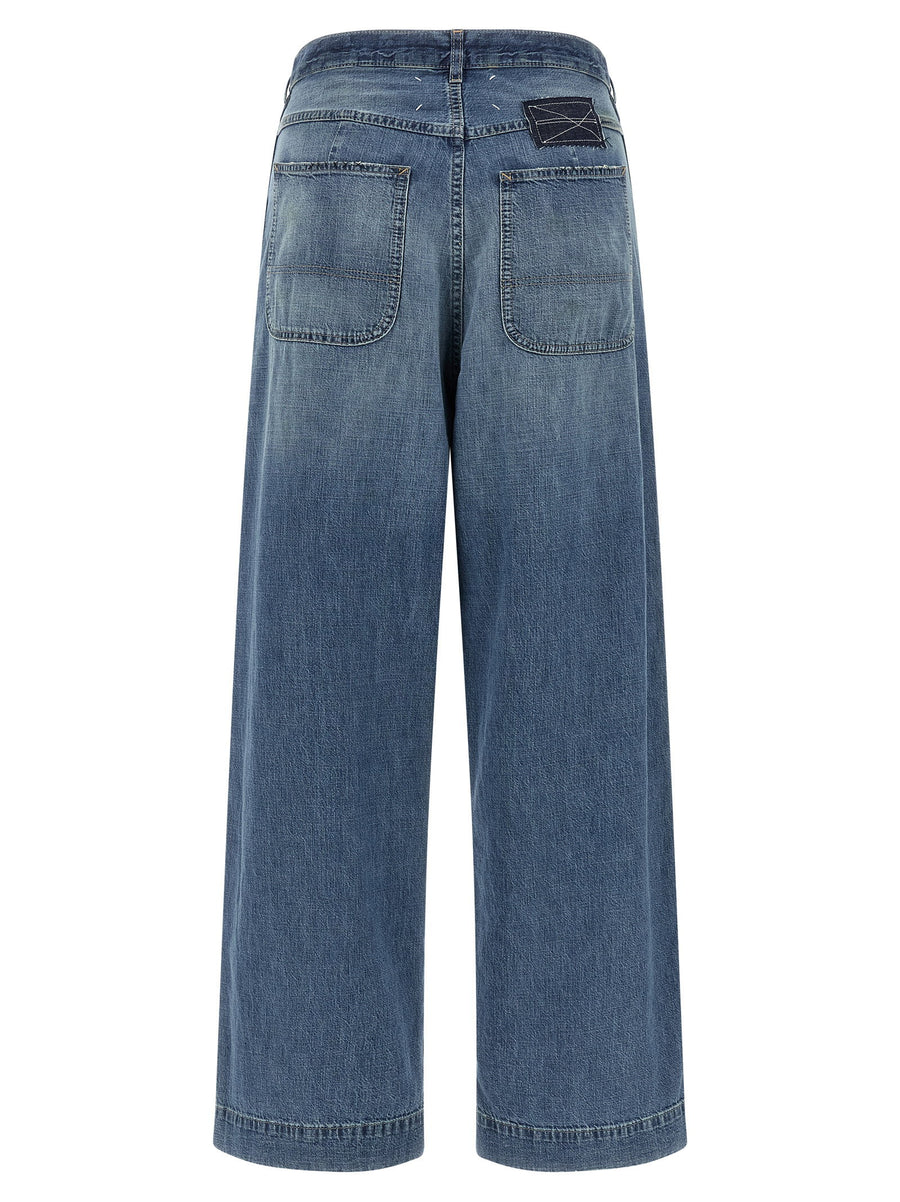 Maison Margiela Four Stitches Jeans For Women With Blue Wide Flare Silhouette And Used Effect Finish