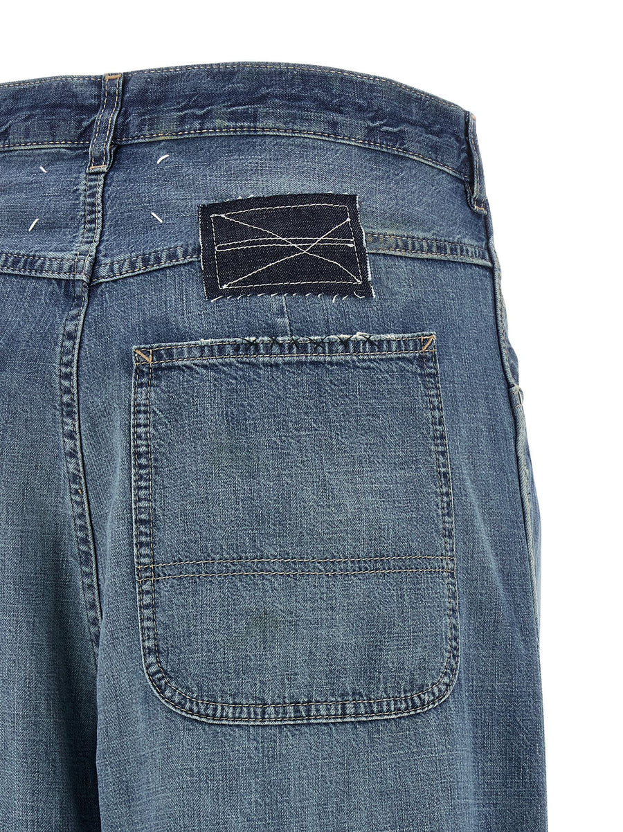 Maison Margiela Four Stitches Jeans For Women With Blue Wide Flare Silhouette And Used Effect Finish